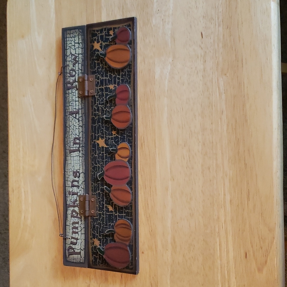 Pumpkins in a Row hanging sign